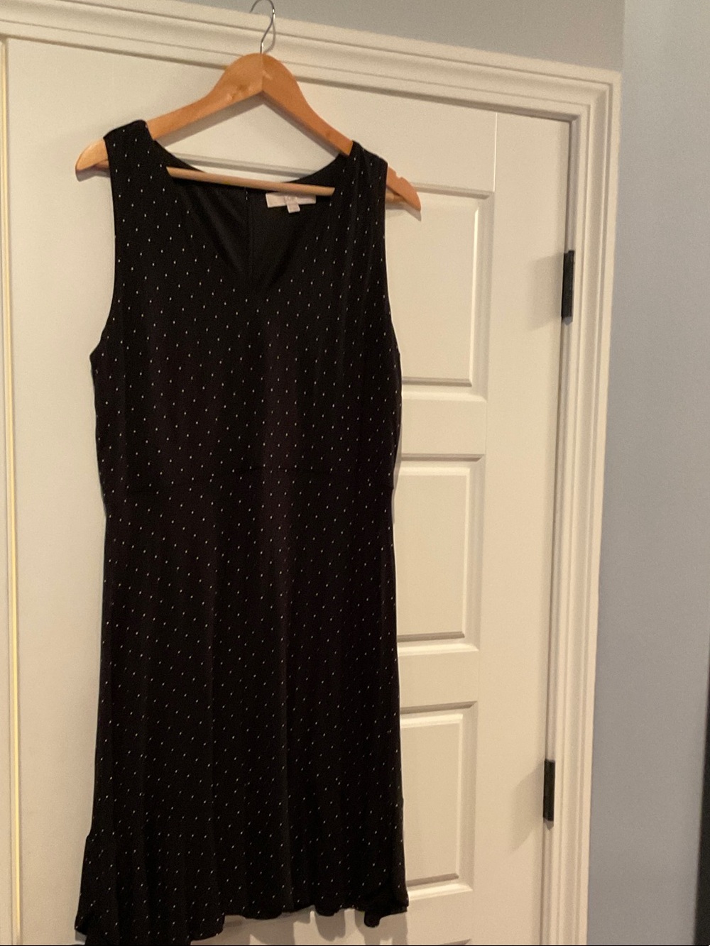 Black Sleeveless V-Neck Dress with Subtle Dot Print
